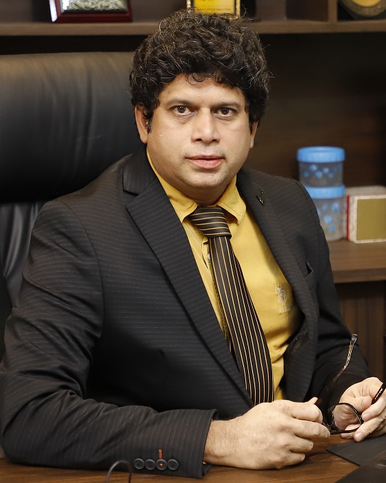 Portrait of Dr. Roshan Kazi, Dean of School of Commerce, Management and Computer Studies